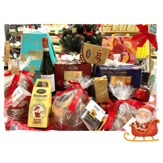Dolci tradizionali di natale, assortimento di dolci natalizi tradizionali (panettone, pandoro, torrone) affiancati da una bottiglia di vino.